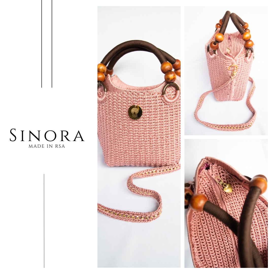 Pink dusty pink Elegant handcrafted woven, crotchet handbag with Bag a strap, wooden handles & African-inspired design by SINORA