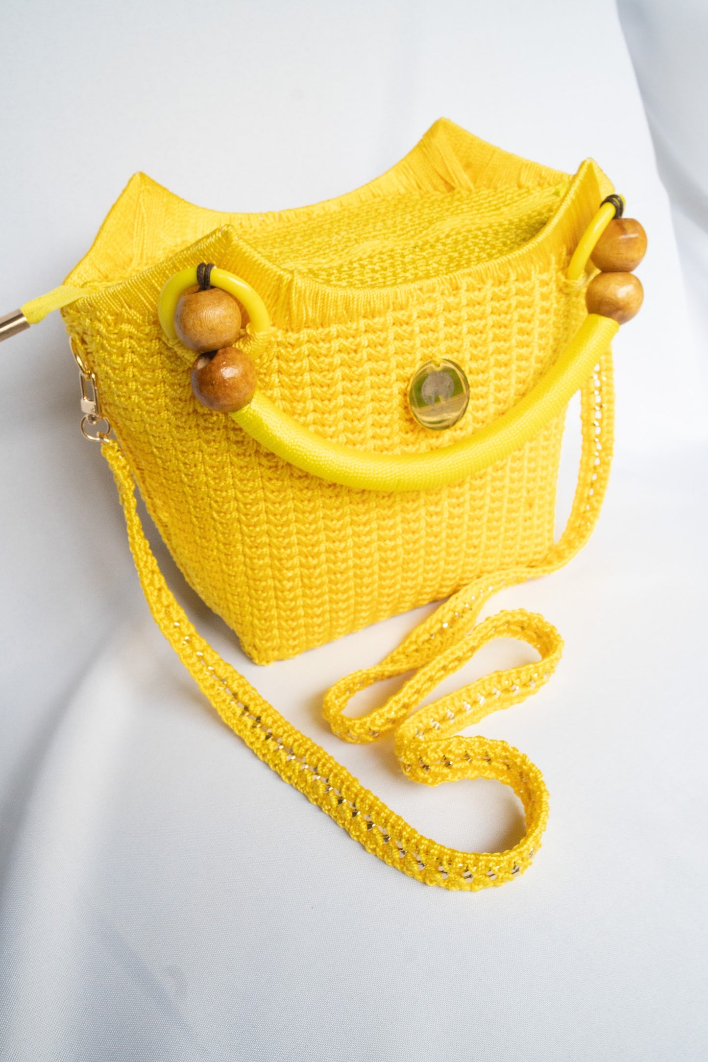 Yellow mustard Elegant handcrafted woven, crotchet handbag with Bag a strap, wooden handles & African-inspired design by SINORA