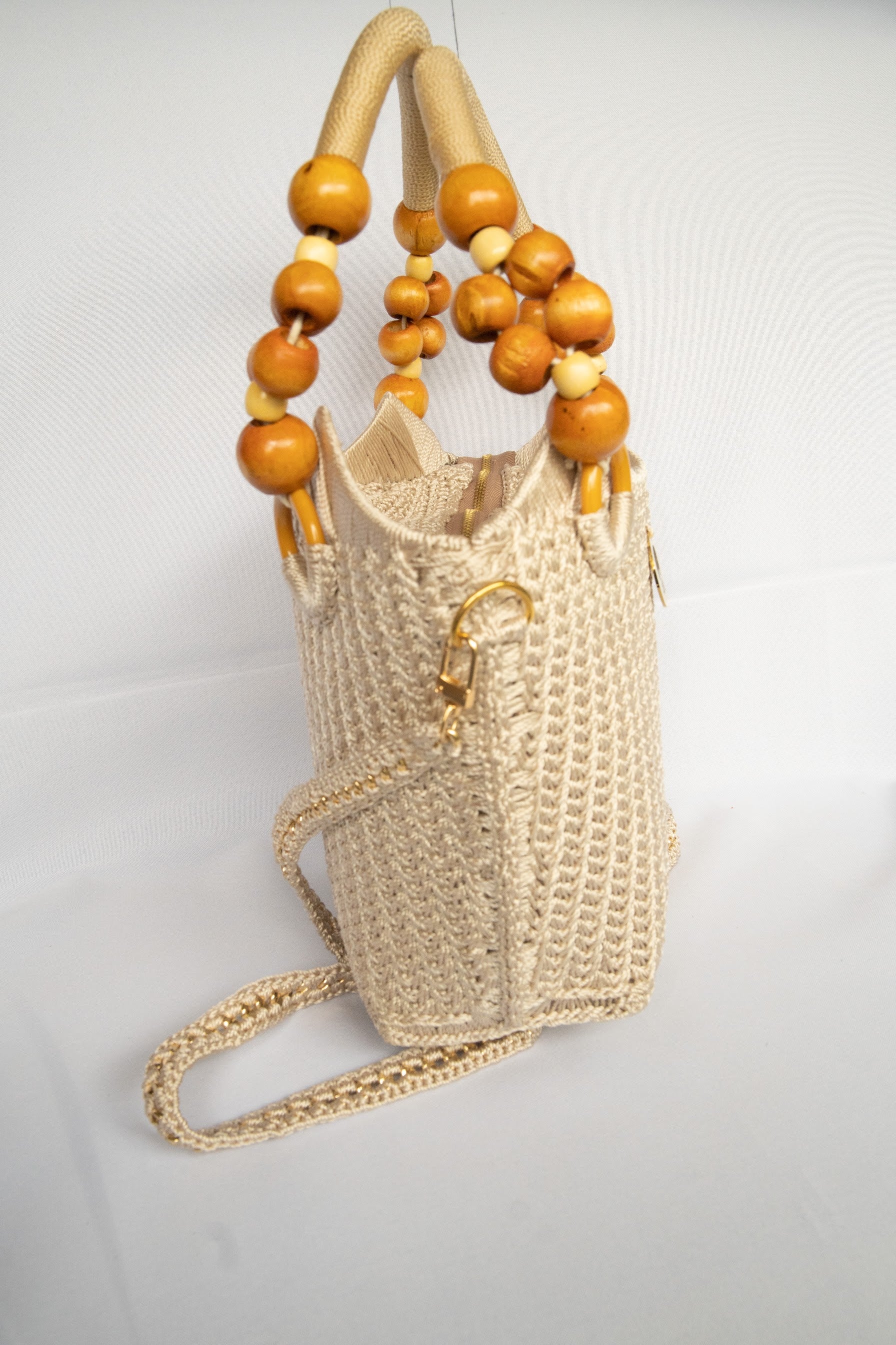 Beige Cream off white Elegant handcrafted woven, crotchet handbag with Bag a strap, wooden handles & African-inspired design by SINORA 