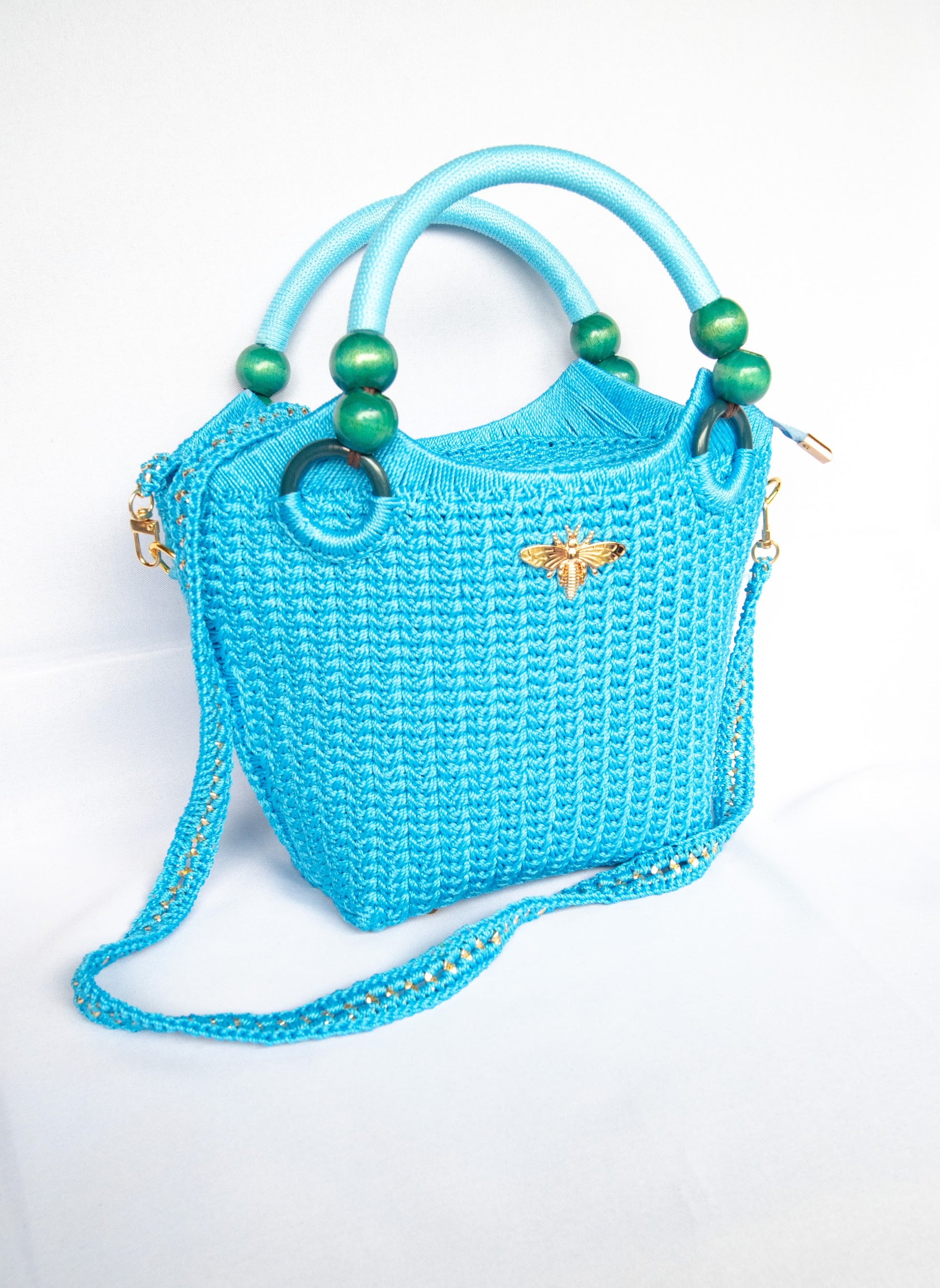 Blue light blue Elegant handcrafted woven, crotchet handbag with Bag a strap, wooden handles & African-inspired design by SINORA 