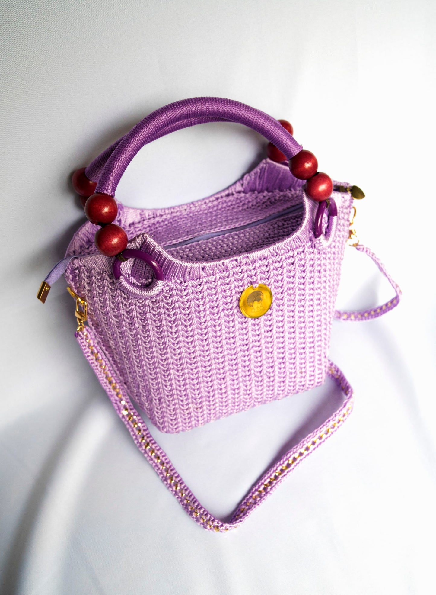 Purple lilac Elegant handcrafted woven, crotchet handbag with Bag a strap, wooden handles & African-inspired design by SINORA 